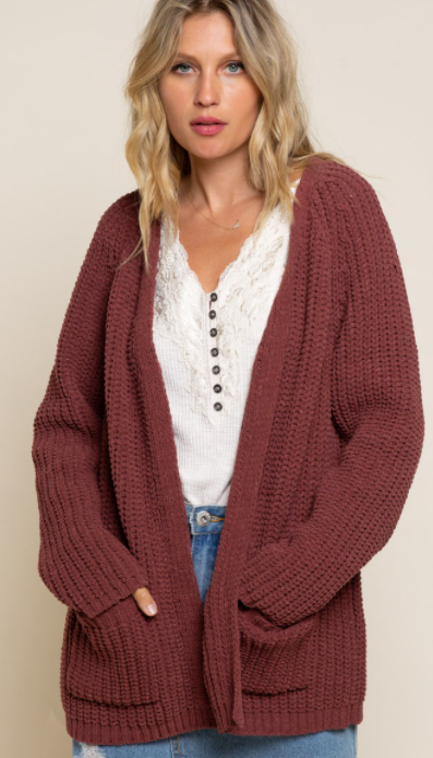 Medium length open front cable knit cardigan